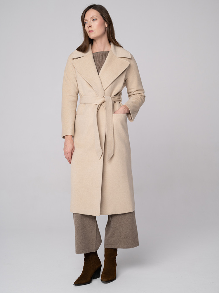 Kremowy płaszcz damski z...